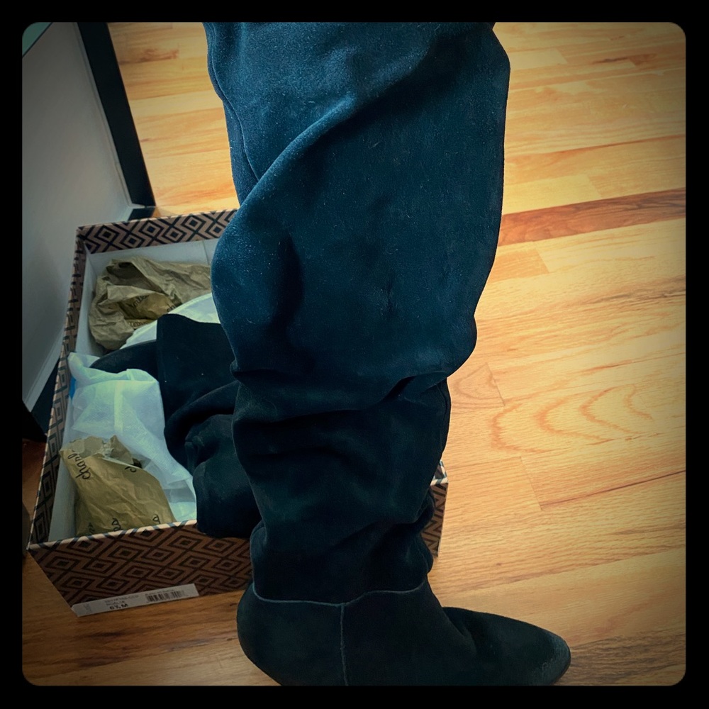 Slouchy black suede boots